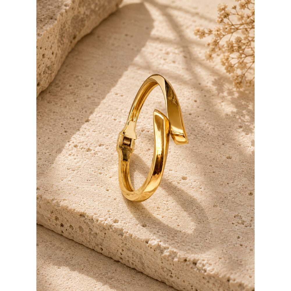 KENARLARI KIVRIMLI, GOLD RENK ASİMETRİK, SPİRAL KELEPÇE ACR9801-2