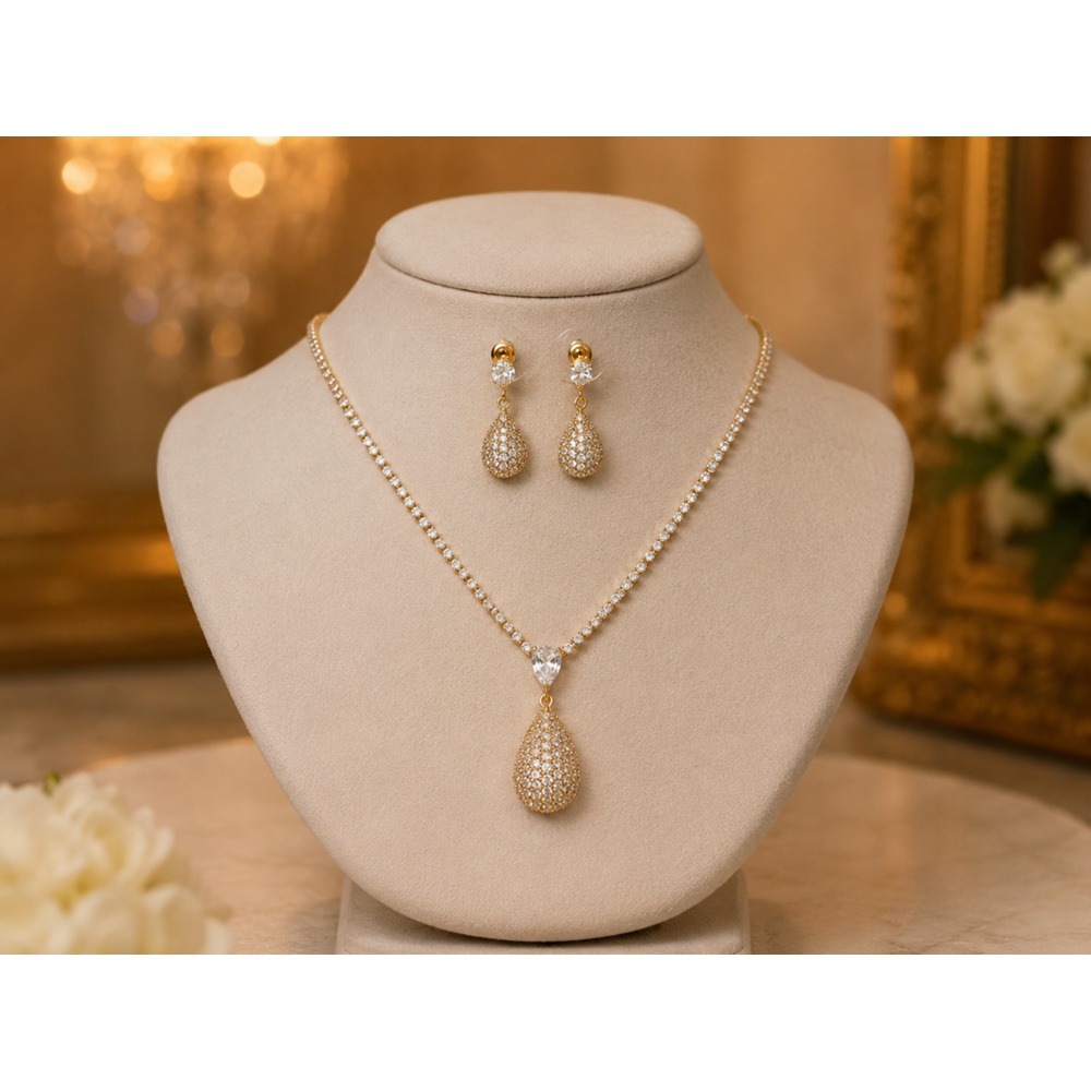 DAMLA MODEL, GOLD RENK, ZİRKON TAŞLI SUYOLU KOLYE VE KÜPE SETİ ACR9835