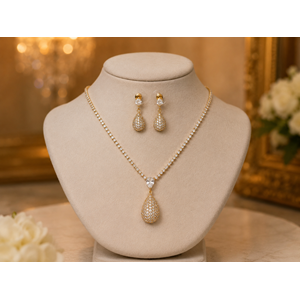 DAMLA MODEL, GOLD RENK, ZİRKON TAŞLI SUYOLU KOLYE VE KÜPE SETİ ACR9835