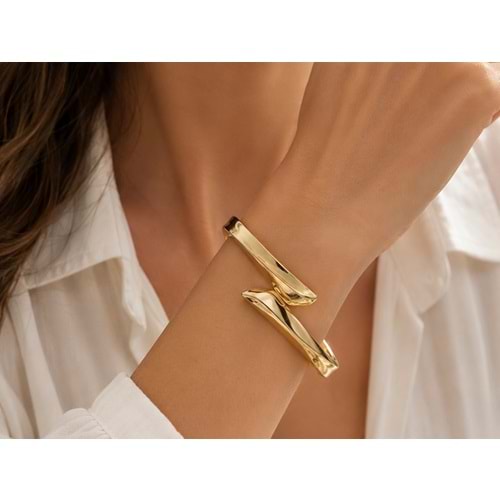 KENARLARI KIVRIMLI, GOLD RENK ASİMETRİK, SPİRAL KELEPÇE ACR9801-2